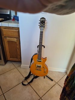 Epiphone Lee Paul Special-II Electric Guitar along with Epiphone Snake pit 15G Amplifier