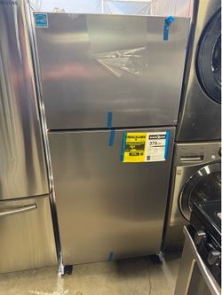 Brand new Amana Stainless Steel top and bottom refrigerator