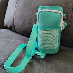 NEW, Tumbler Holder W/ Adjustable Strap, Zipper Compartment. See Photos. Cash And Pickup Only 