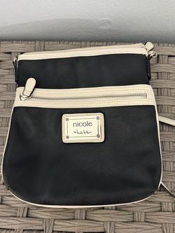 Nicole Miller Crossbody Bag, Black Exterior and Pink Interior, 9.5” x 9.5”