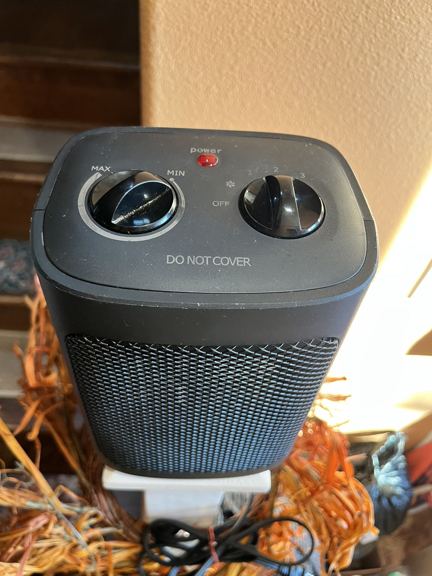 Compact electric heater with adjustable settings. Small black electric space heater with adjustable settings. Used a few times. Perfect for any small