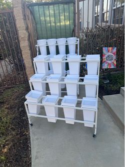 Selling- For vendors, coordinators, party hosts. Flower bloom cart assembled, with 12 square buckets, all new,