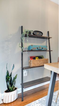Bookshelf that Leans Against The Wall