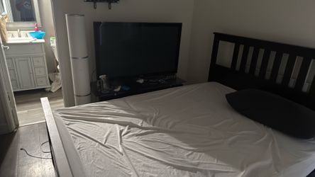 Free queen size bed/frame and old plasma tv works fine /and tv stand /cabinet