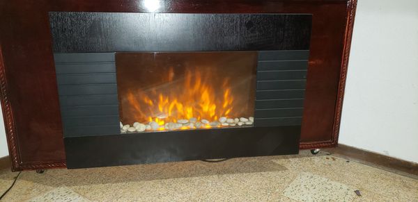 36x22 new wall mount fireplace with 2 heat settings. 750watt, 1500watt