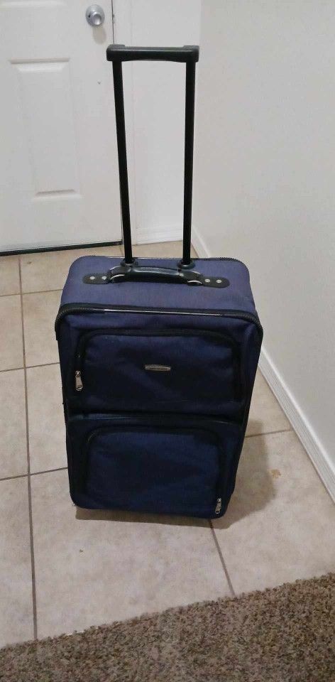 Medium Sized Blue Concourse Rolling Luggage Asking $40 firm Must Pick Up Broadway And APACHE BUCKEYE AZ CASH ONLY PLS THANKS
