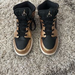 Gold Nike Air Jordan’s 