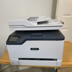 Printer XEROX C235 for parts. It doesn't work 
Screen doesn't show up. 
Cartridges still full. 