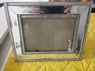 28 in wide by 30 in tall wood framed with glass wall art $2.50