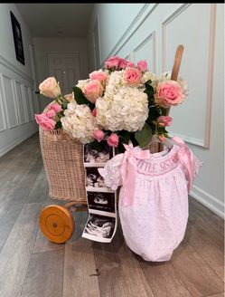 Wicker stroller for floral arrangement