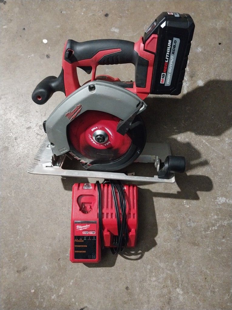 Milwaukee Circular Saw with Left Side Blade 6 - 1/2" Saw is Lilibit Used Barry 8 AH Charger are Brand New