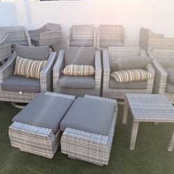 Outdoor wicker funiture set. Chairs, ottomans, barstools. Paid over $8000