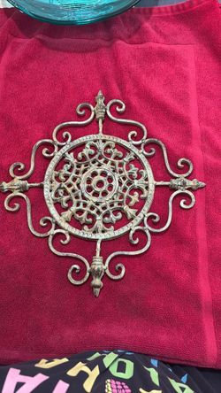 Vintage ornate cast iron decorative piece,