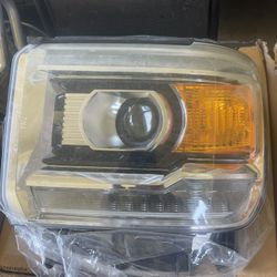 2014 GMC 1500 Headlights OEM