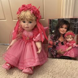 Marie Osmond Porcelain Doll with collection book & authenticity certificate