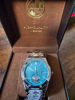 AJ Quality Watches Mens silver bracelet and blue aqua face