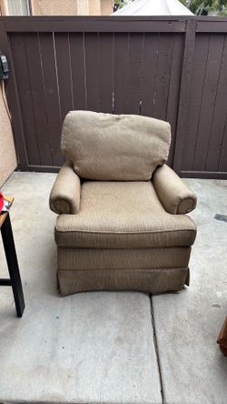 Large cushioned chair