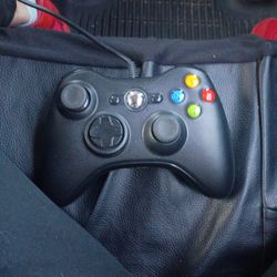 Black Xbox Controller  And Games 