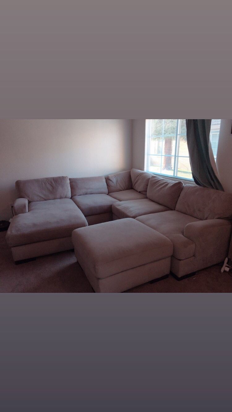Like New, Super comfy 4 piece Sectional couch with extra corner piece *not in picture* and extra pillows