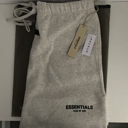 Essentials fear of god light oatmeal shorts