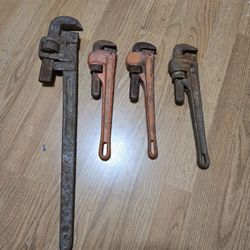 4 steel pipe wrenches (3) 14" / (1) 24"
