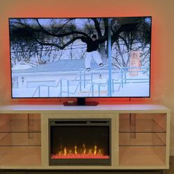 🔥 Moving Sale – Samsung 65” TV + Sectional Sofa + Fireplace Stand (Downtown Seattle)