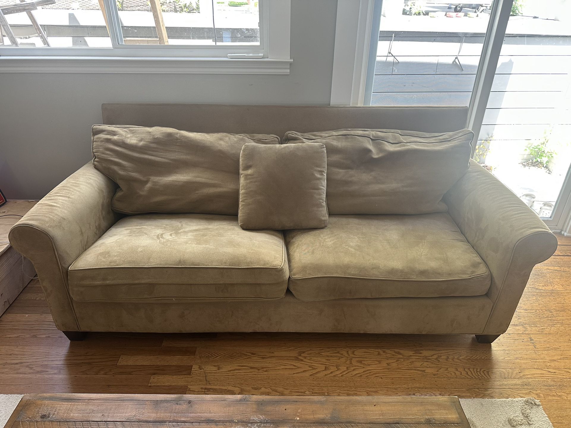 Brown Couch With 2 Pillows