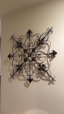 Wall decor iron design with orange gems