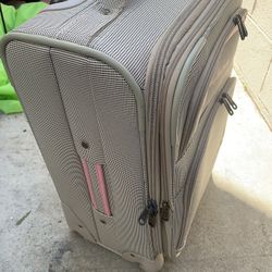Spinner Carry-on Suitcase. From Tommy Bahamas Reduced
