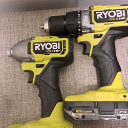 RYOBI

ONE+ HP 18V Brushless Cordless 1/2 in. Hammer Drill and 1/4 in 4-Mode Impact Driver Kit w/ (2) Batteries, Charger, & Bag