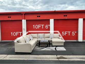 5 pcs Ashley furniture beige U-shape sectional with nailhead trim