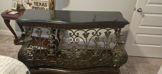 Elegant wood table with granite top. $150 OBO