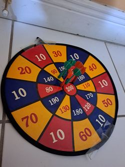 Dart board with five darts
