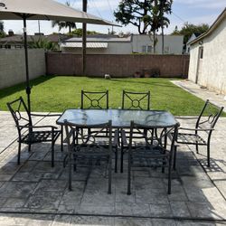 Glass And Metal Glass Table And Chairs