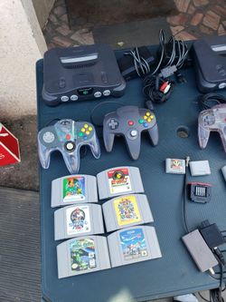 Nintendo N64 with 2 Controls. Red Expansion packed. 2 memory Controls. Games & All Cables $300! Each bundles or $525 all. Or trade up