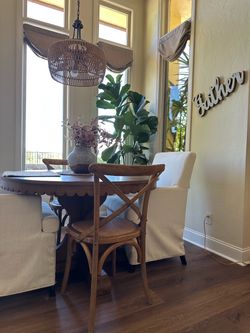 Magnolia home top tier round dining table by Joanna Gaines
