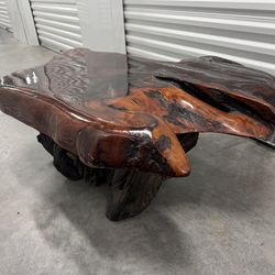 Redwood burl table. There are a couple of defects, as seen in the photo.