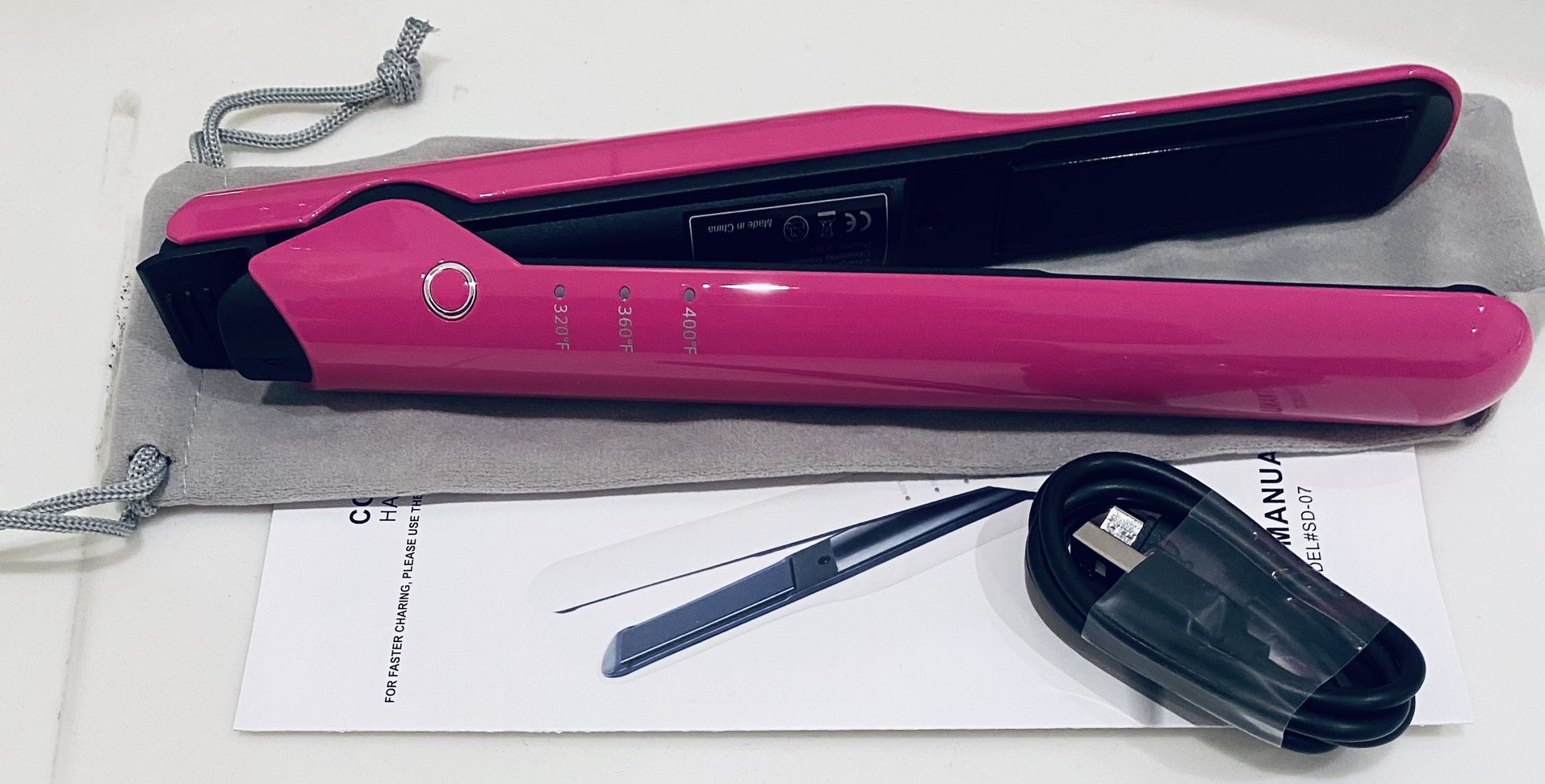 Cordless rechargeable flat iron hair straightener. (Cordless rechargeable straightening brush also available) Only measures 8.5” in length making it e
