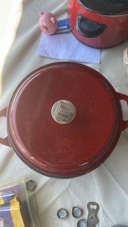Red cast iron Wolfgang puck