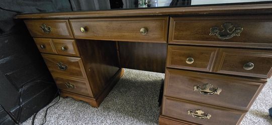 Wood desk with glass top.