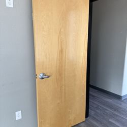 Commercial Doors With Door Handle And Wall Attachment. 