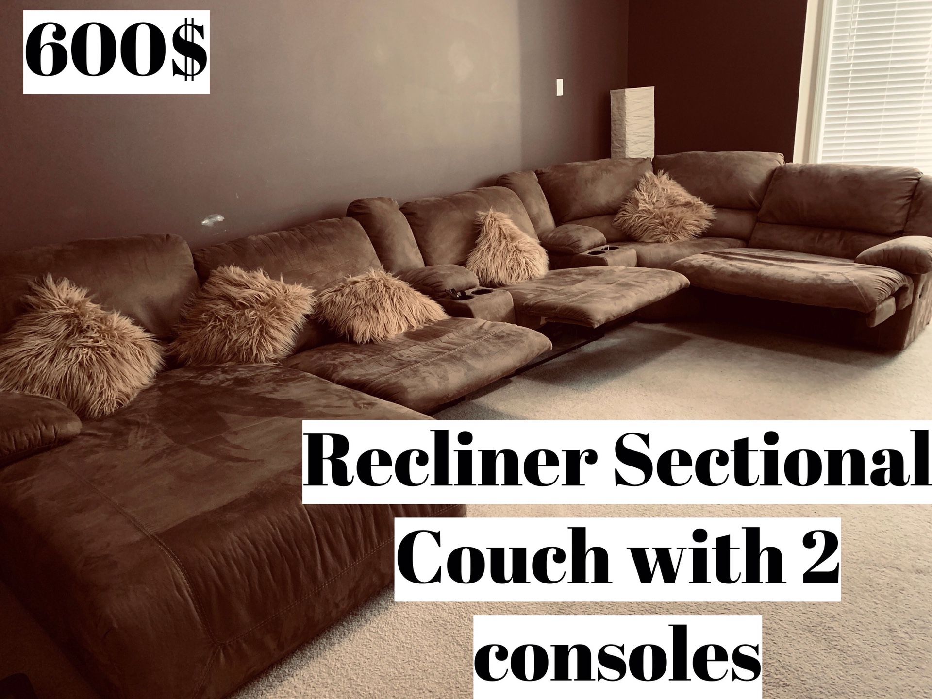 Recliner couch with two consoles