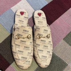 Newspaper Gucci Mules 
