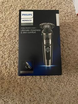 Philips . Shaver 9000 Prestige, Rechargeable Wet or Dry Electric Shaver with Trimmer Attachme