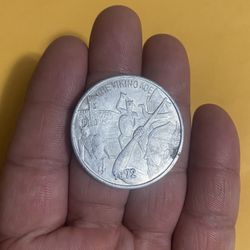 Selling a 1972 aluminium collectible coin, asking for $10 