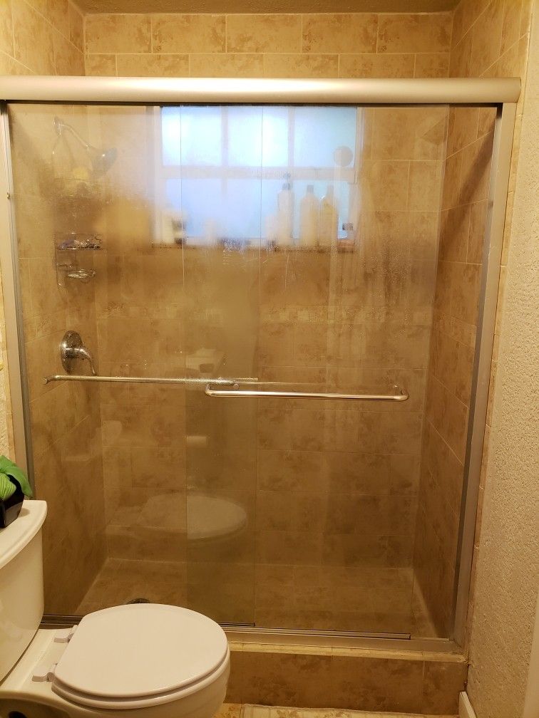 Glass shower door with frame 58" x 70"