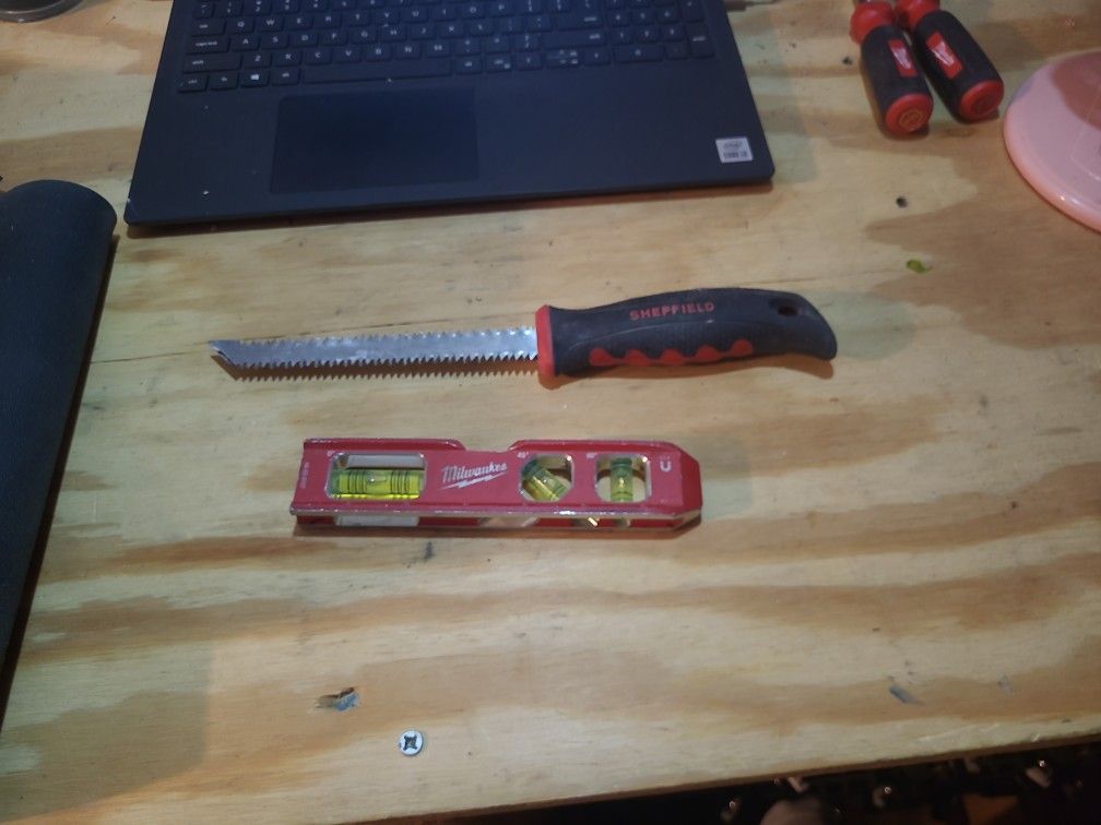 Level And Drywall Saw