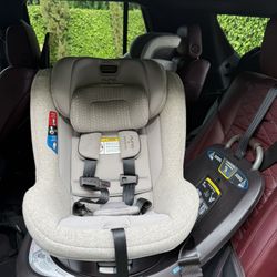 Nuna REVV Rotating Convertible Car Seat – Droplet Dot