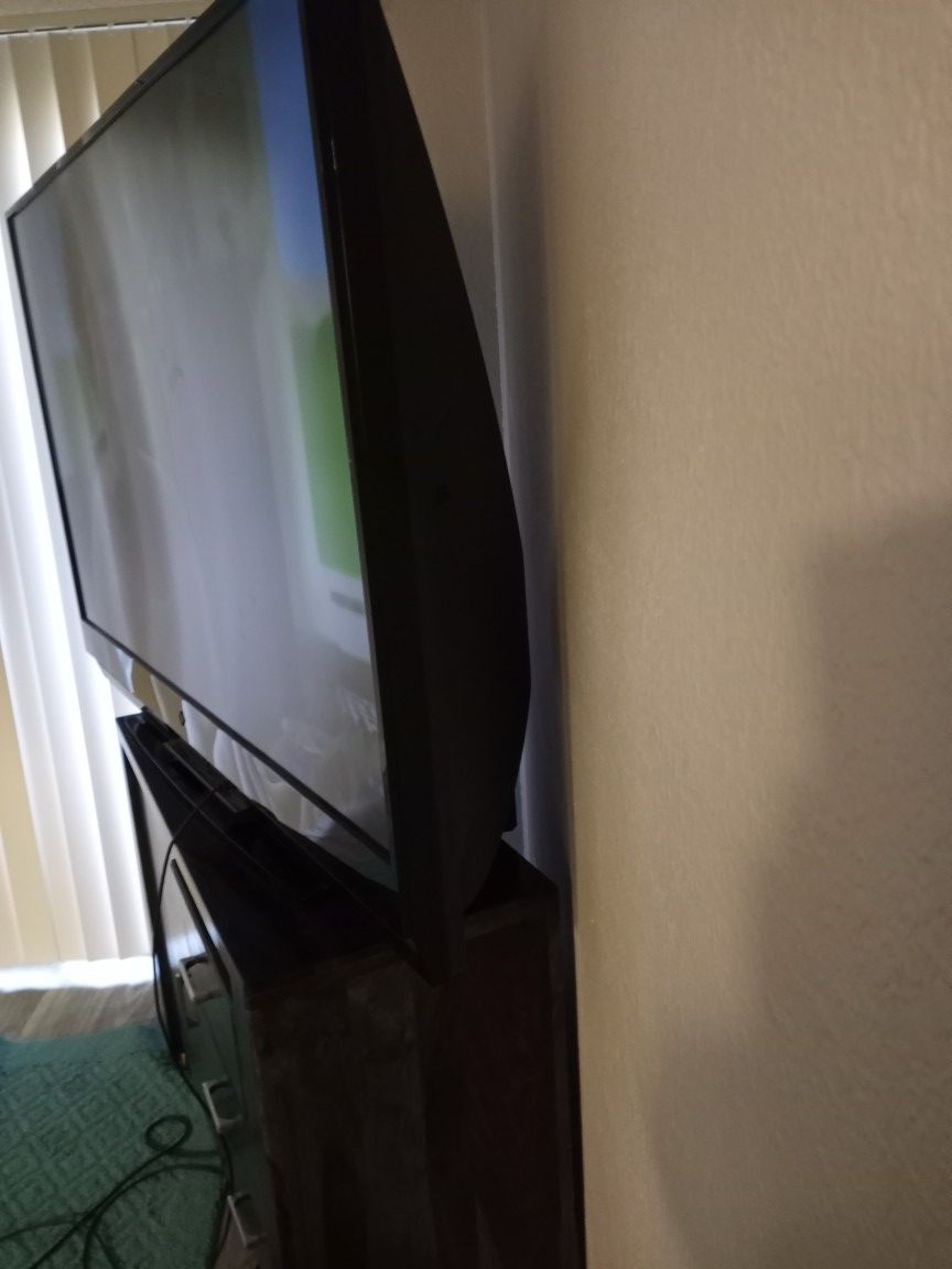 66 inch mitsubishi tv & nice wood dresser