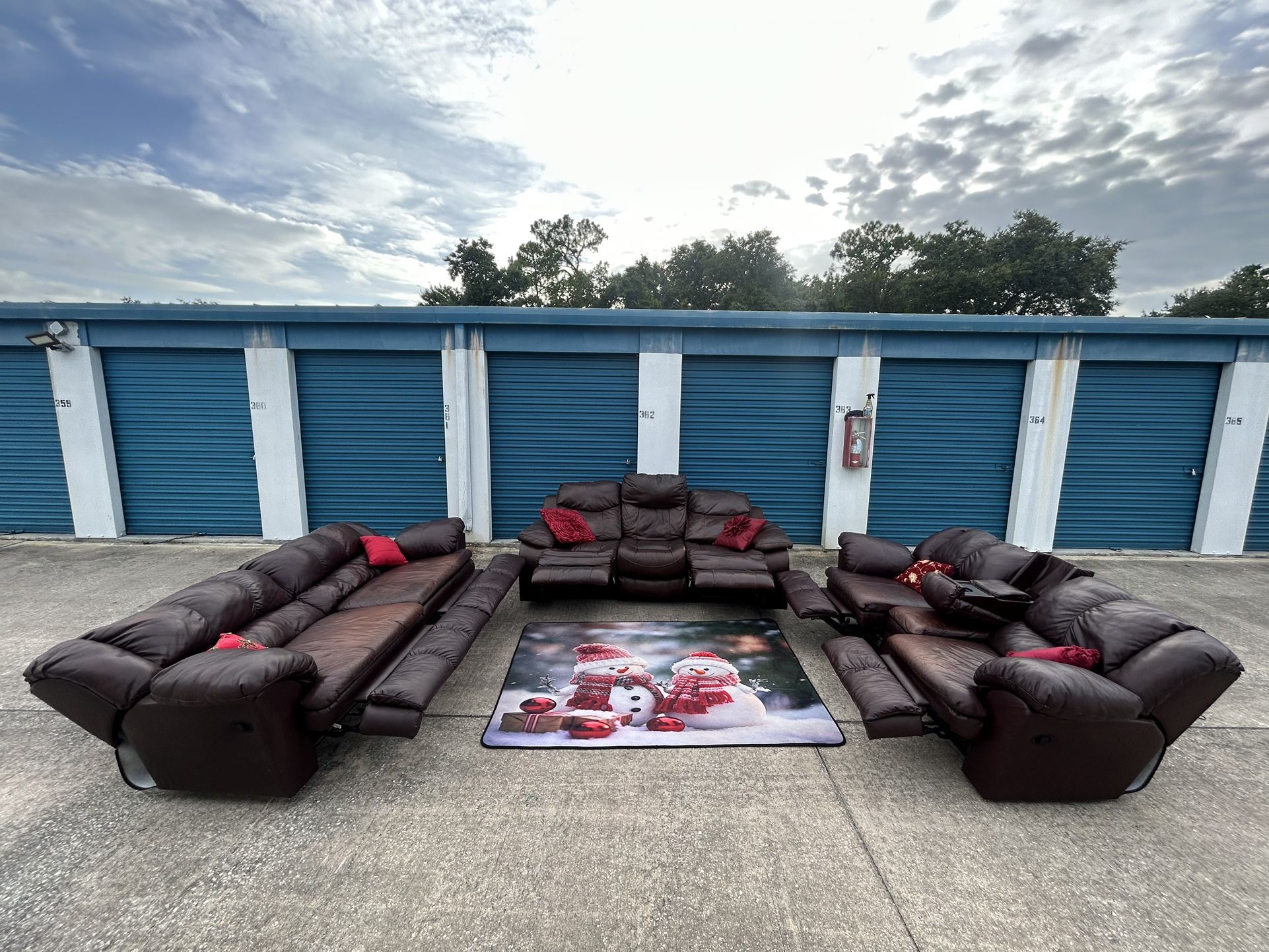 Three leather burgundy couches